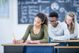 Girl doing a writing exam